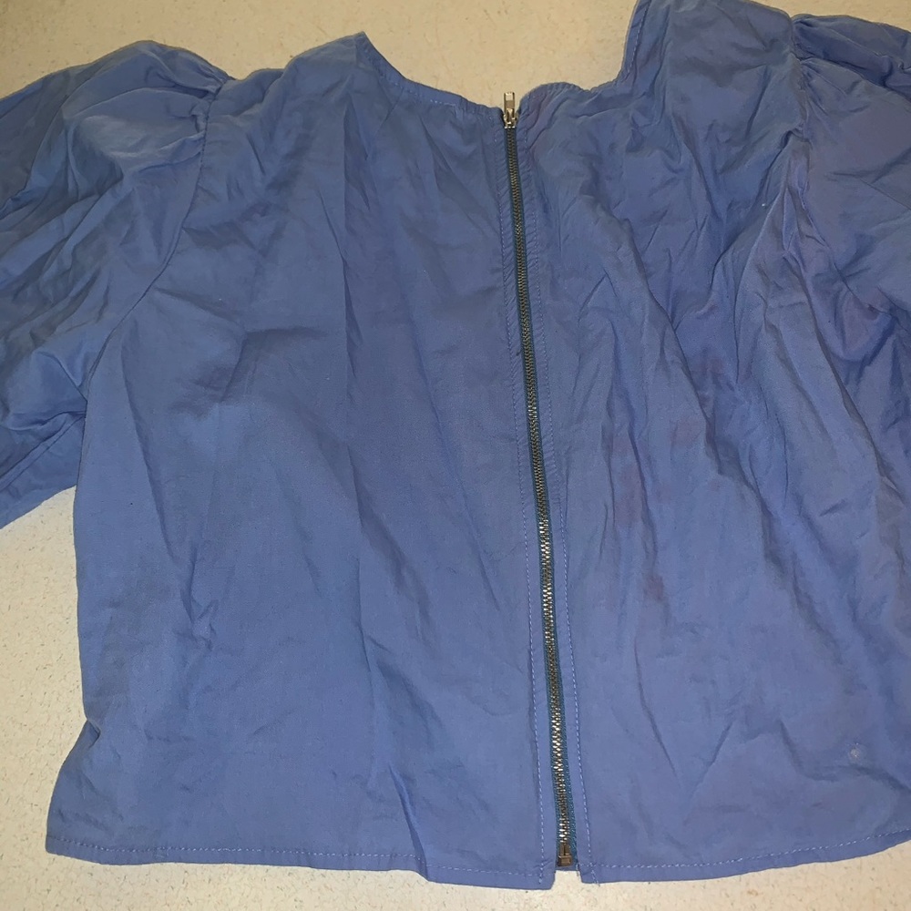 Flared out blue blouse